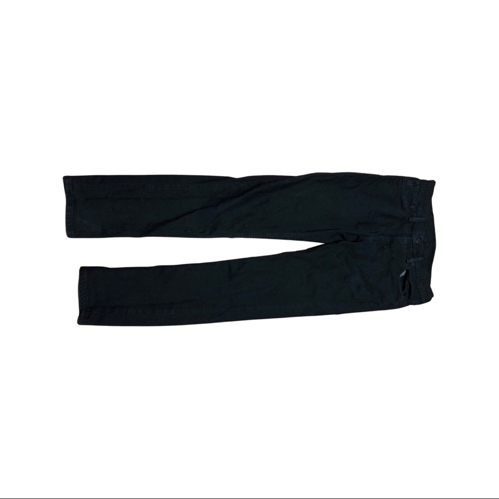 Levi’s, dark blue pants.
